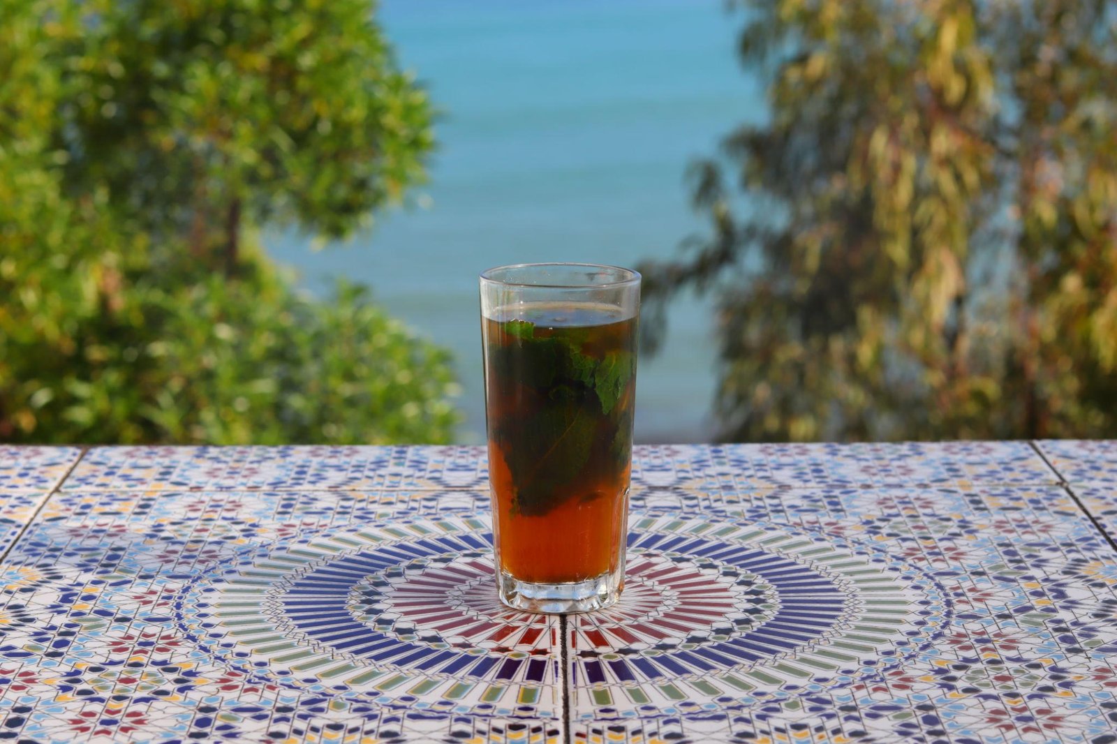 Fresh Moroccan mint tea being poured into a glass