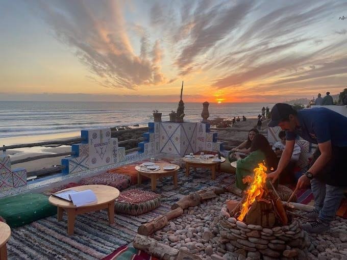 Coastal view of Tamraght Morocco with surf camps overlooking the Atlantic Ocean.